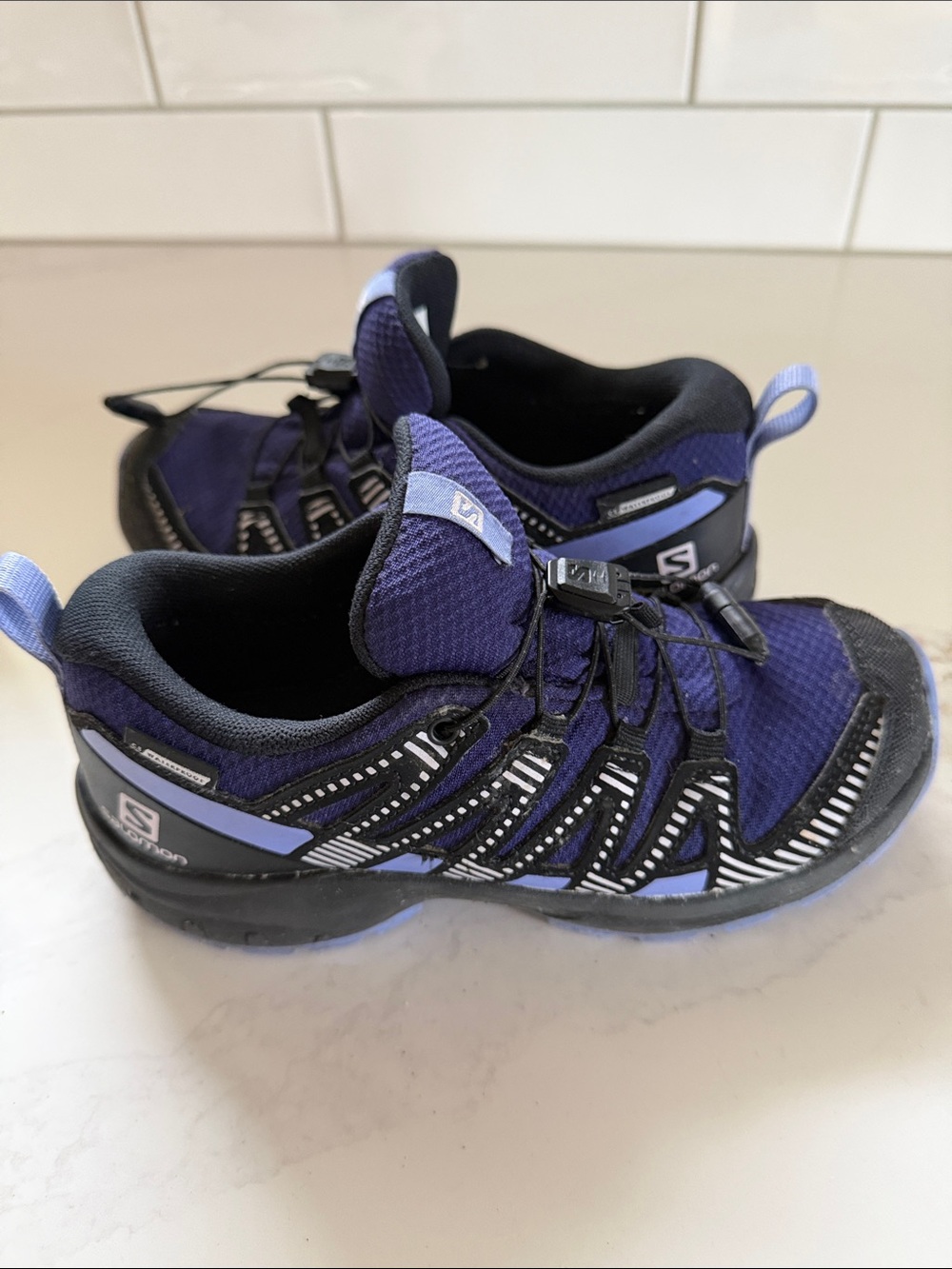Salomon Kids Purple and Black Trail Sneaker